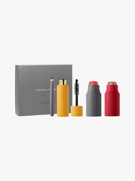 Westman Atelier Petite Party in multiple branded components on a light gray background