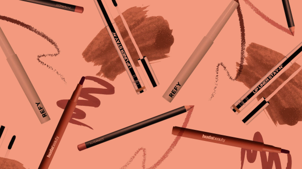 A collage of lip liner pencils and scribbles on a peachypink background